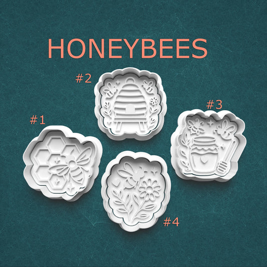 Set of four honeybee-themed cookie cutters on a teal background with 'HONEYBEES' text.