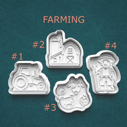 Set of farming-themed cookie cutters on a teal background