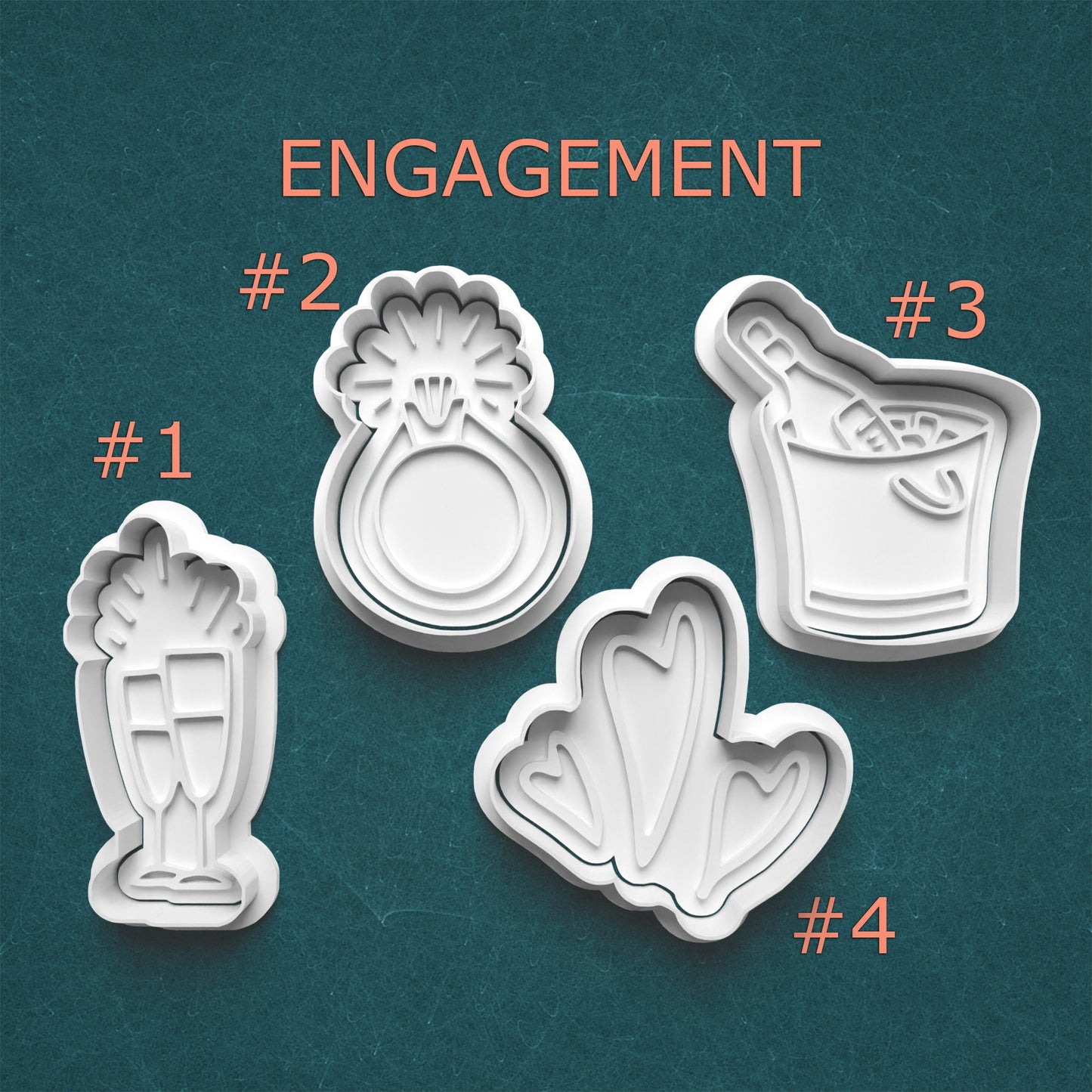 Set of four cookie cutters shaped like wedding rings and hearts on a teal background.