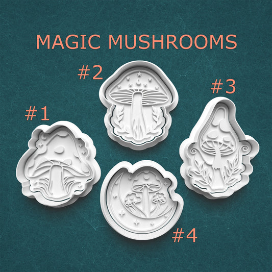 Four mushroom-shaped cookie cutters with decorative designs on a teal background.