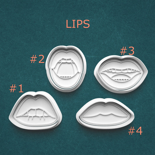 Four lip-shaped cookie cutters with different designs on a teal background
