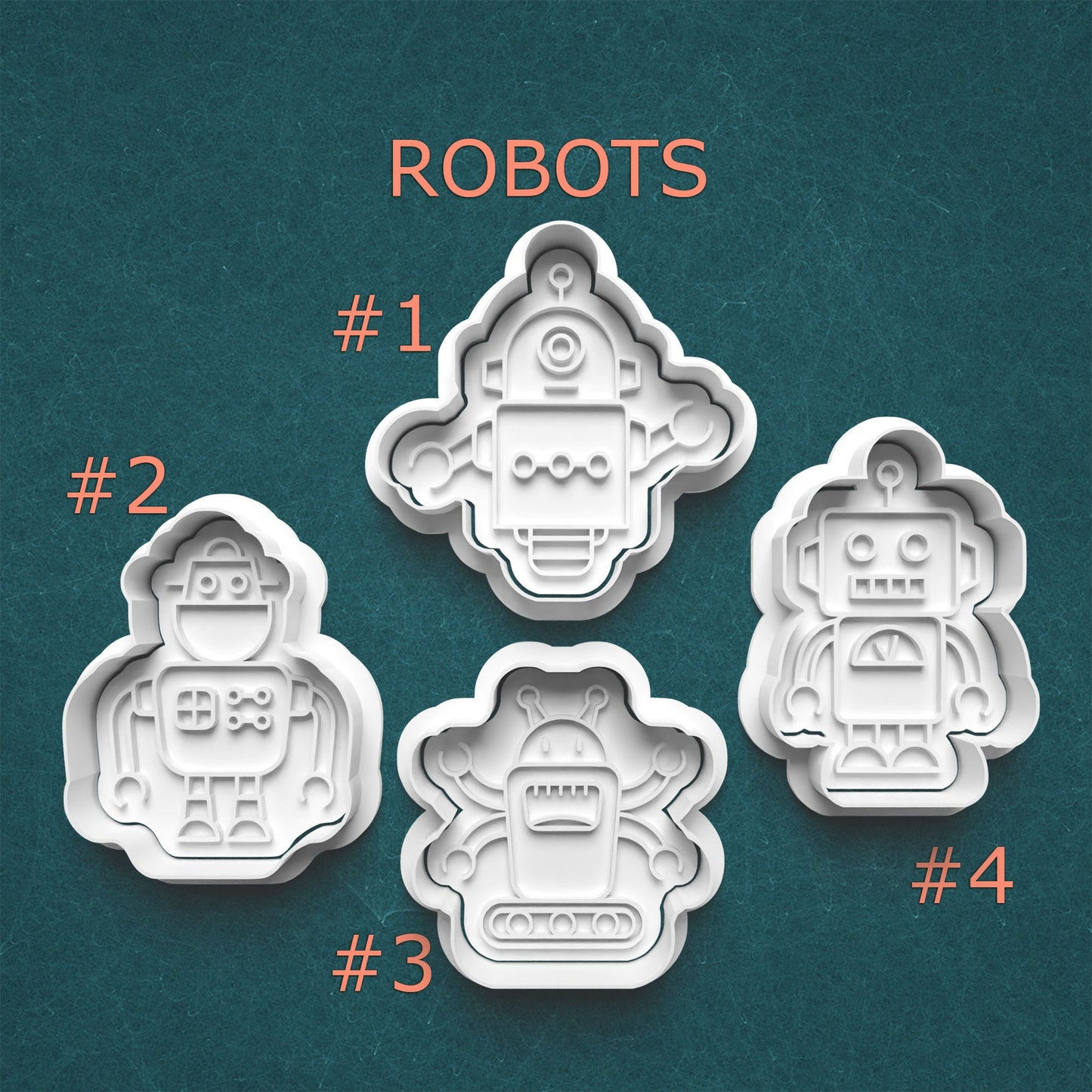 Set of four robot-shaped cookie cutters on a teal background