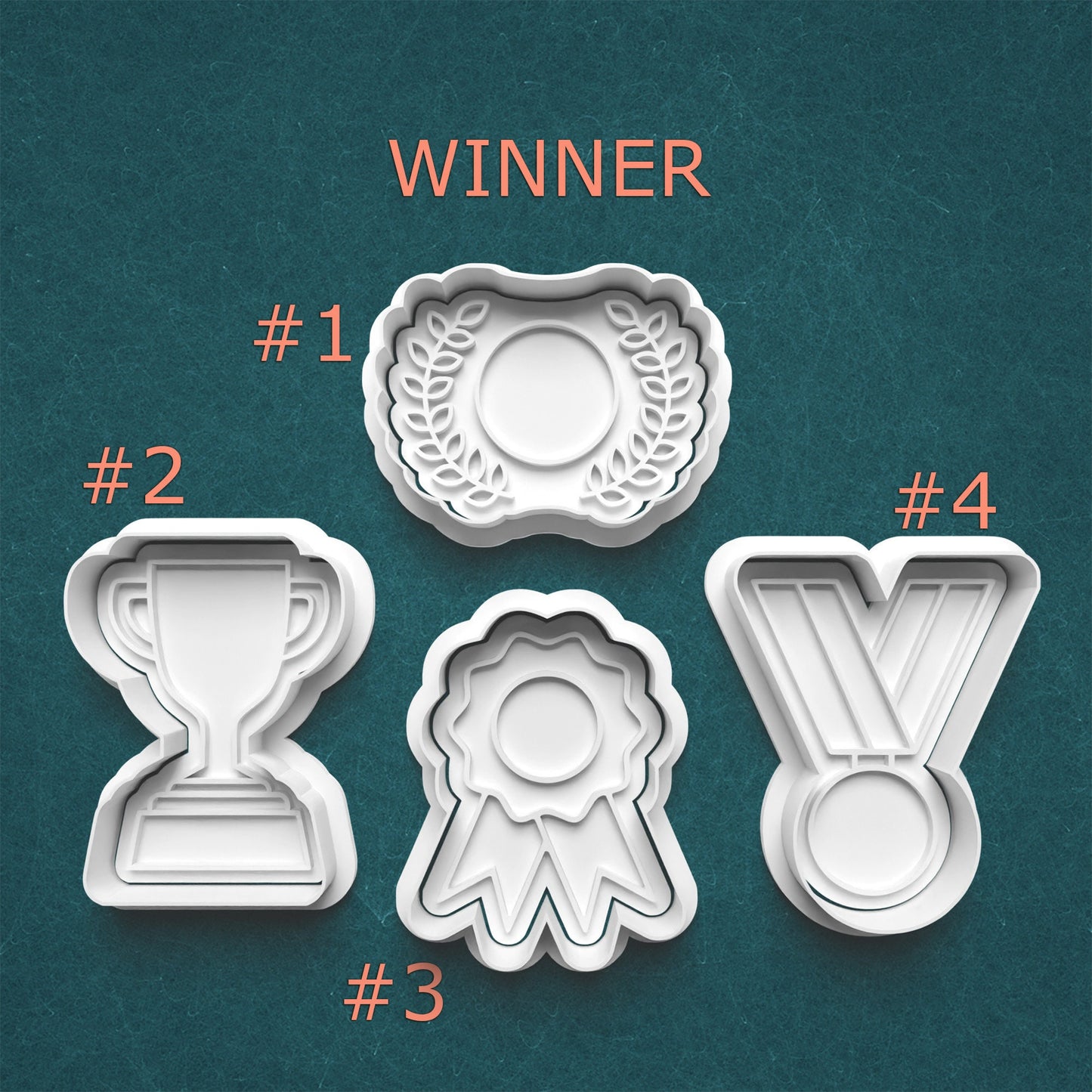 Set of four cookie cutters shaped like a trophy, wreath, ribbon, and 'Y' on a teal background.