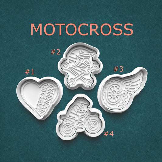 Set of motocross-themed cookie cutters on a teal background