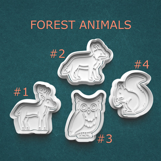 Set of four forest animal cookie cutters on a teal background with 'FOREST ANIMALS' text.