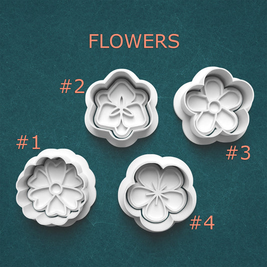 Four flower-shaped cookie cutters on a teal background with numbers indicating their order.