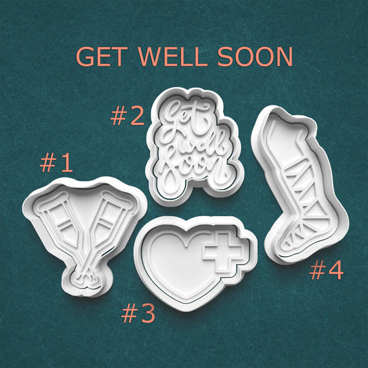 Set of cookie cutters with 'Get Well Soon' text and various shapes on a teal background.