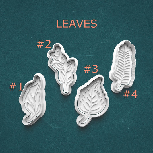 Set of four leaf-shaped cookie cutters on a teal background with 'LEAVES' text above.