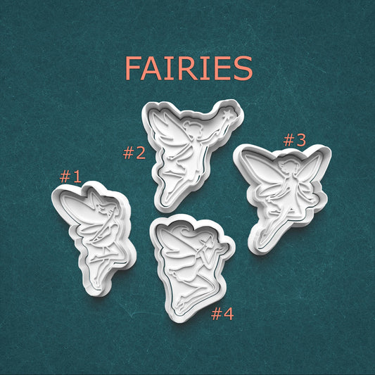 Four fairy-shaped cookie cutters on a teal background with 'FAIRIES' text above.