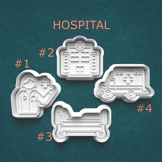 Set of four cookie cutters shaped like a hospital, doctor, ambulance, and patient bed on a teal background.