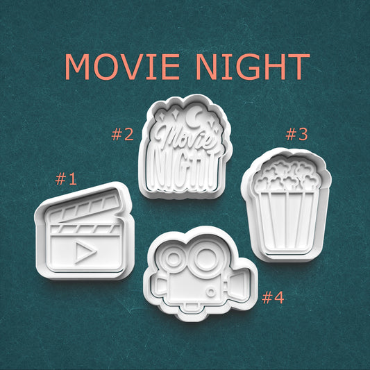 Set of four movie-themed cookie cutters with 'Movie Night' text on a teal background.