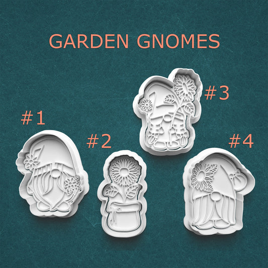 Four garden gnome cookie cutters with numbers on a teal background