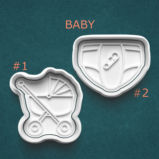 Two cookie cutters shaped like baby items on a teal background with 'BABY' text above.