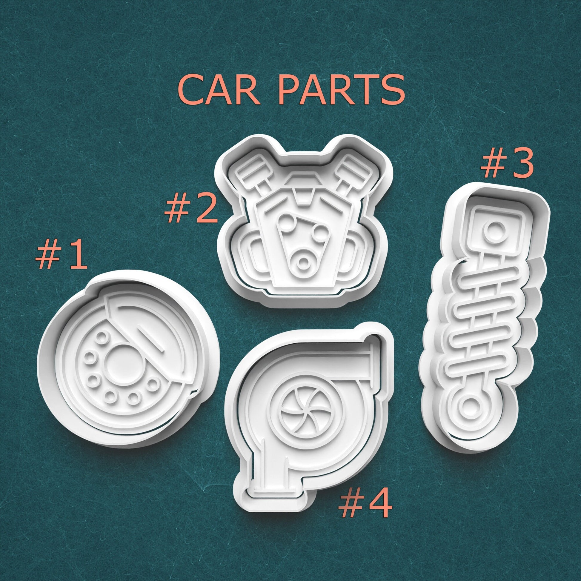 Set of car part-themed cookie cutters on a teal background