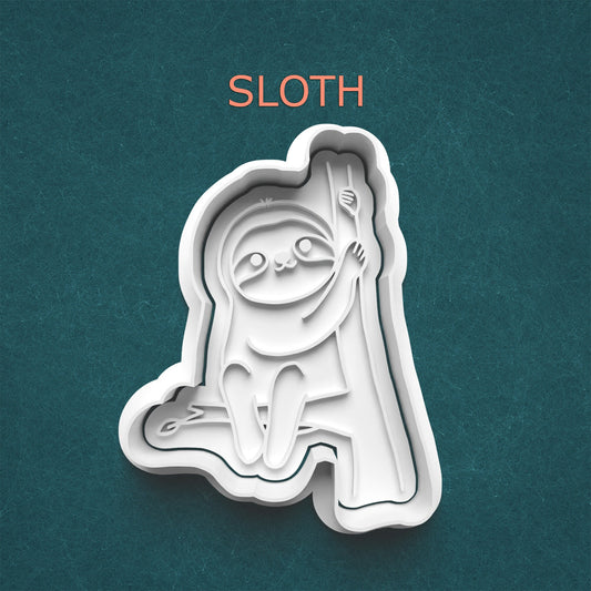 Sloth-shaped cookie cutter on a teal background with 'SLOTH' text above.