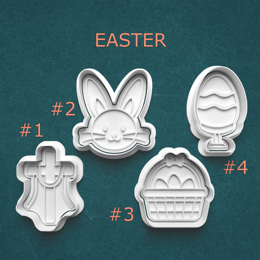 Set of four Easter-themed cookie cutters on a teal background