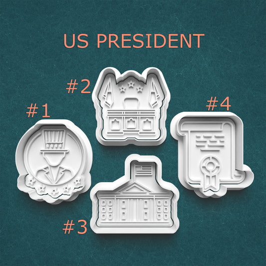 Set of four cookie cutters with designs of US presidents on a teal background