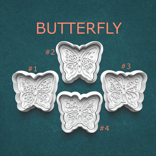 Four butterfly-shaped cookie cutters with numbers on a teal background