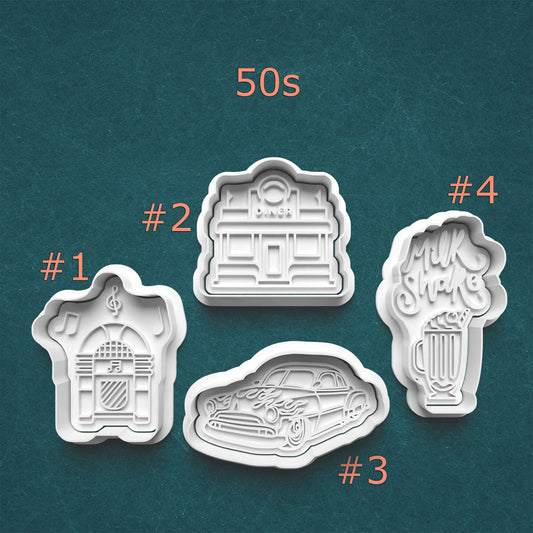 Set of four cookie cutters with 1950s-themed designs on a teal background.