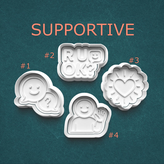 Set of four cookie cutters with text and shapes on a teal background, labeled 'Supportive'.