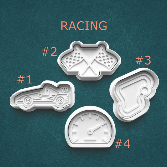 Four racing-themed cookie cutters on a teal background