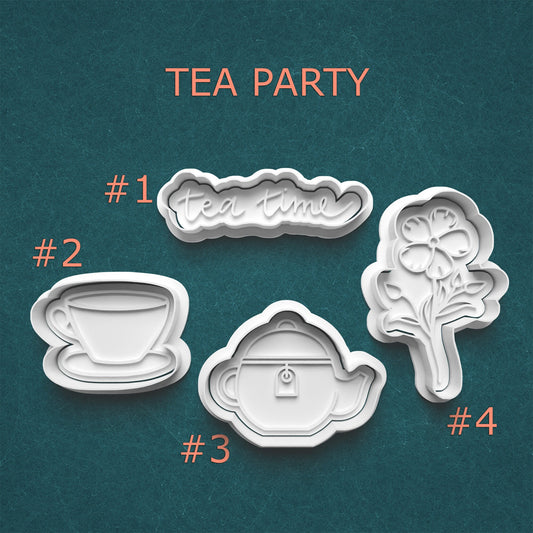 Set of four cookie cutters with 'tea party' theme on a teal background