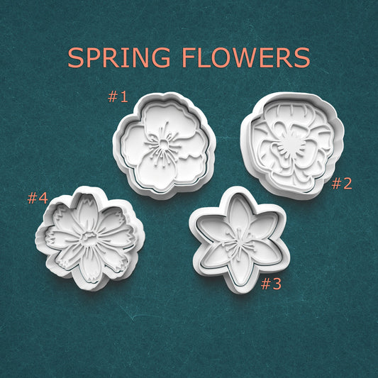 Four floral cookie cutters on a teal background with 'Spring Flowers' text.
