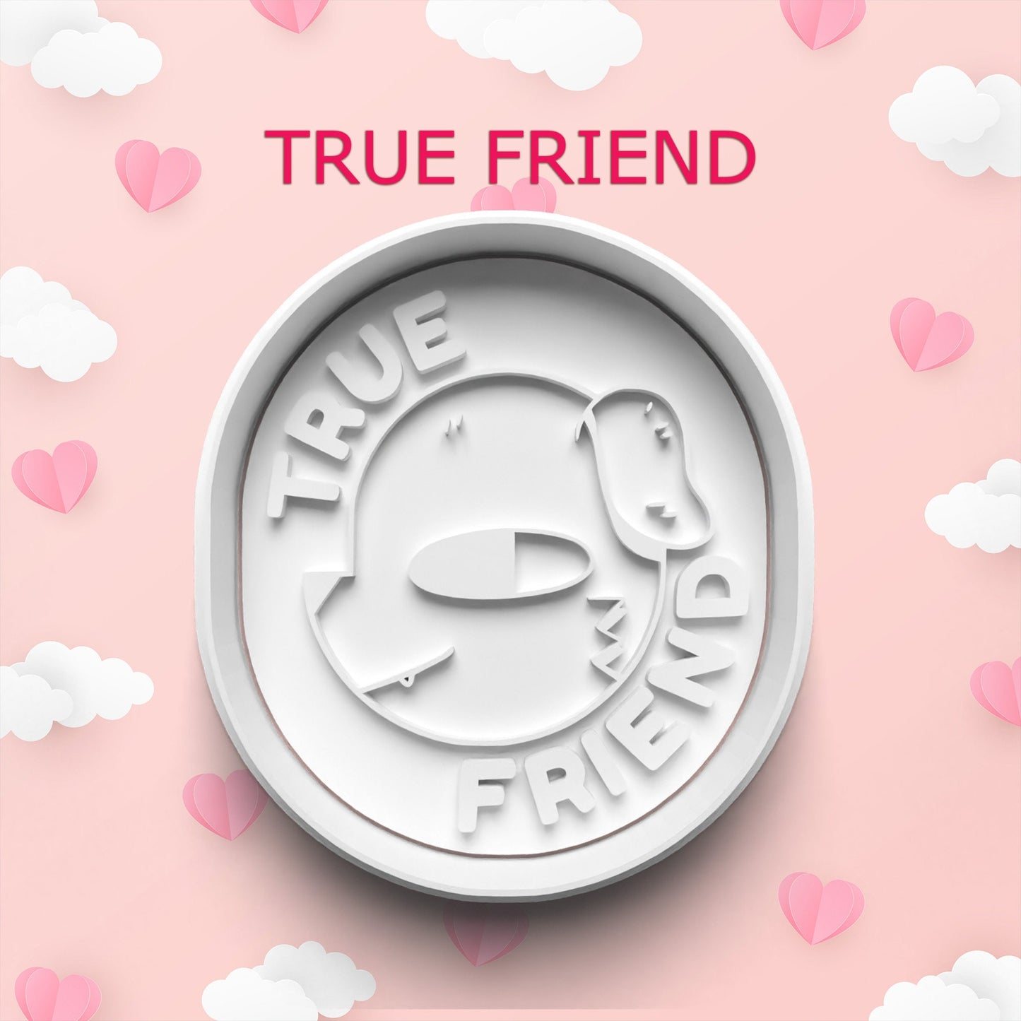 White 'True Friend' cookie cutter on a pink background with hearts and clouds