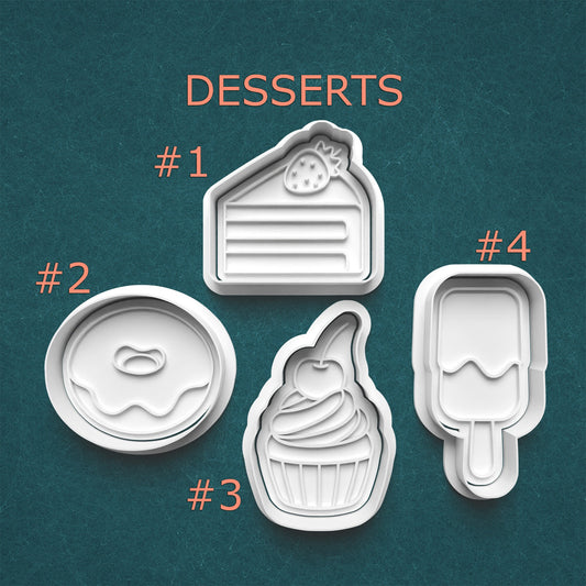 Set of dessert-themed cookie cutters on a teal background
