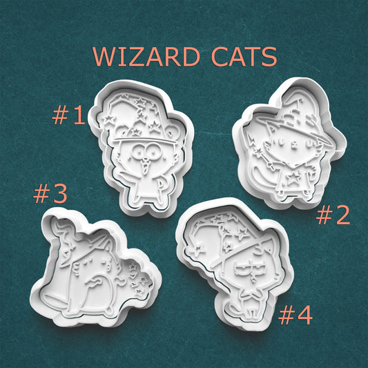 Set of four cookie cutters with 'Wizard Cats' design on a teal background