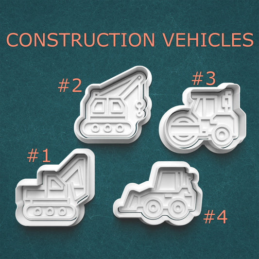 Set of construction vehicle-shaped cookie cutters on a teal background with text 'CONSTRUCTION VEHICLES'.