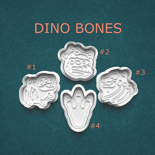 Set of four dinosaur bone-shaped cookie cutters on a teal background with 'DINO BONES' text.