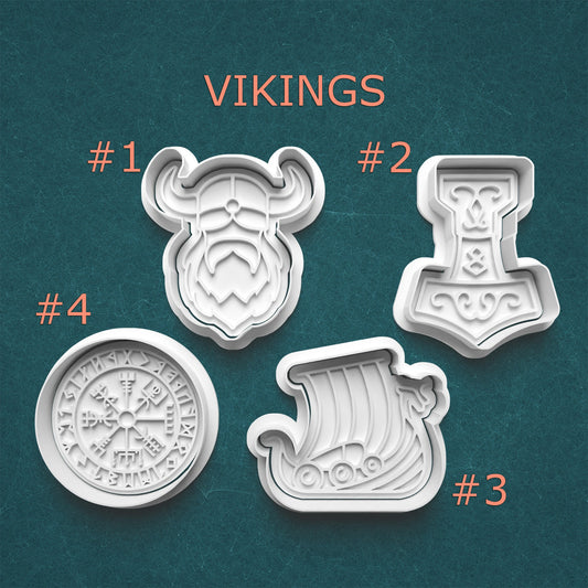 Four Viking-themed cookie cutters on a teal background with 'VIKINGS' text.