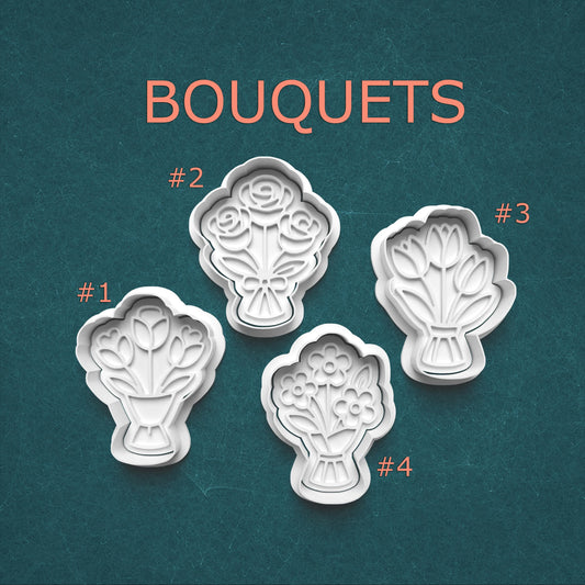 Set of four floral cookie cutters labeled #1, #2, #3, and #4 on a teal background.