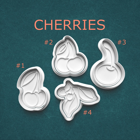 Set of four cherry-shaped cookie cutters on a teal background with 'CHERRIES' text.