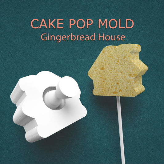Gingerbread house cake pop mold on a green background