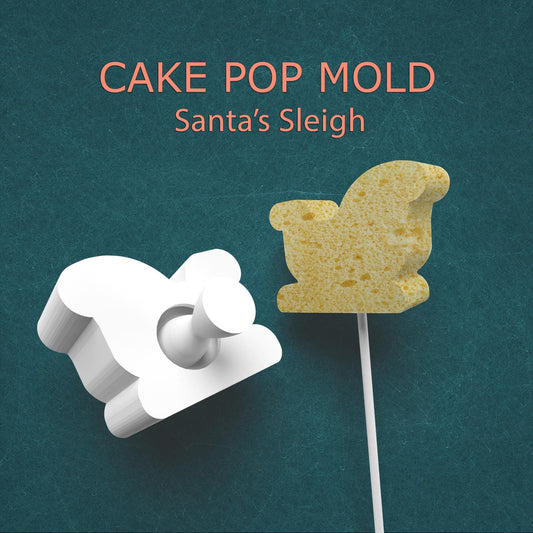 Cake pop mold shaped like Santa's sleigh on a green background